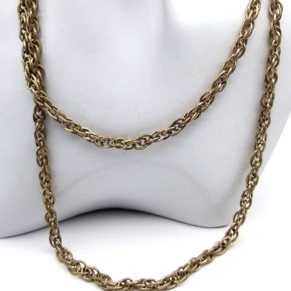 Laced gold tone chain estate